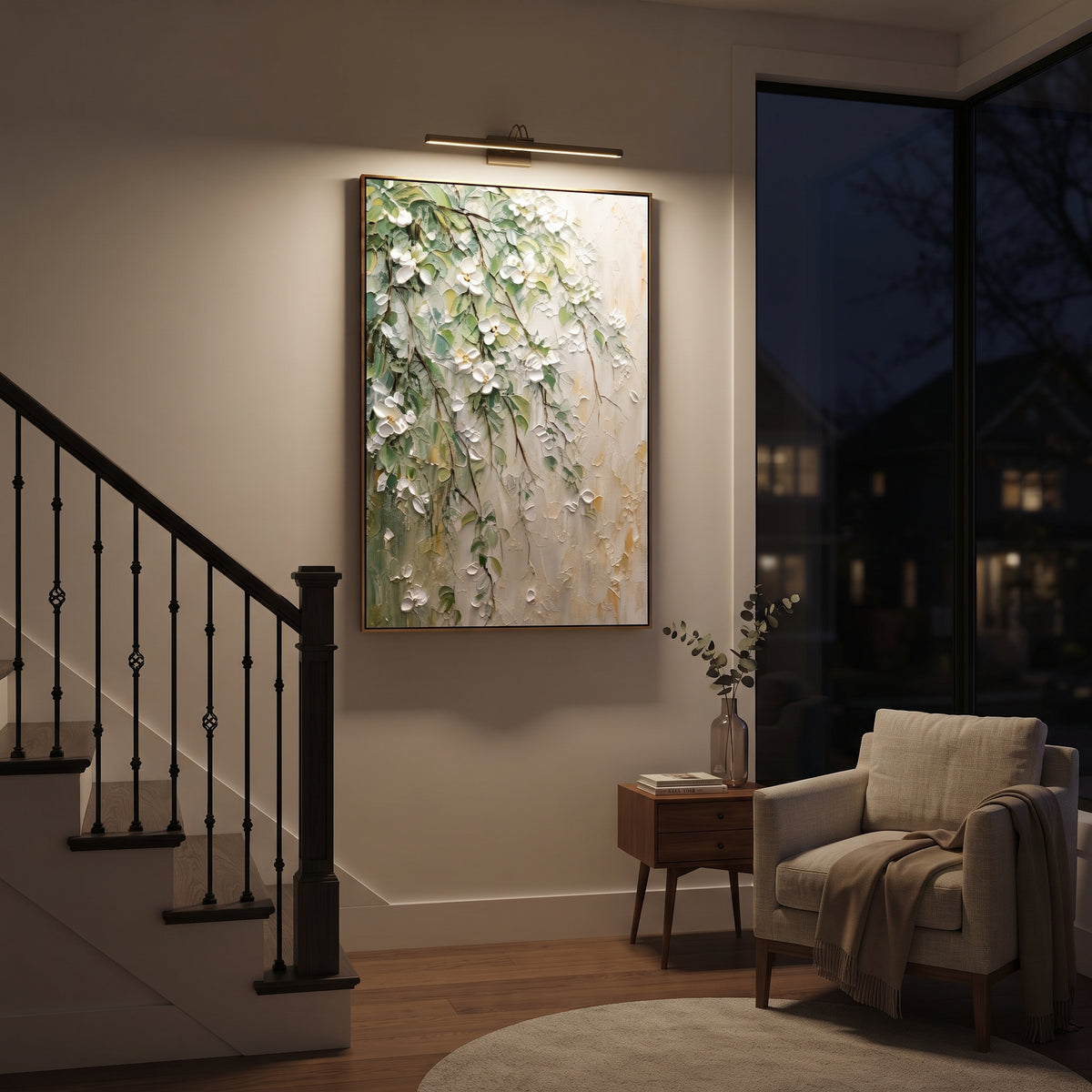 "White Green Floral Branch Painting" focuses on atmosphere, surface movement, and sculptural heavy impasto craftsmanship rather than a fixed literal storyline. The composition uses this hand-painted vertical canvas presents white raised blossoms and green leaves trailing diagonally over a pale textured wall, with thin brown branches and soft gold touches as the visual anchor, while layered palette-knife paint, raised plaster-like texture, and softened brush movement create tactile depth across
