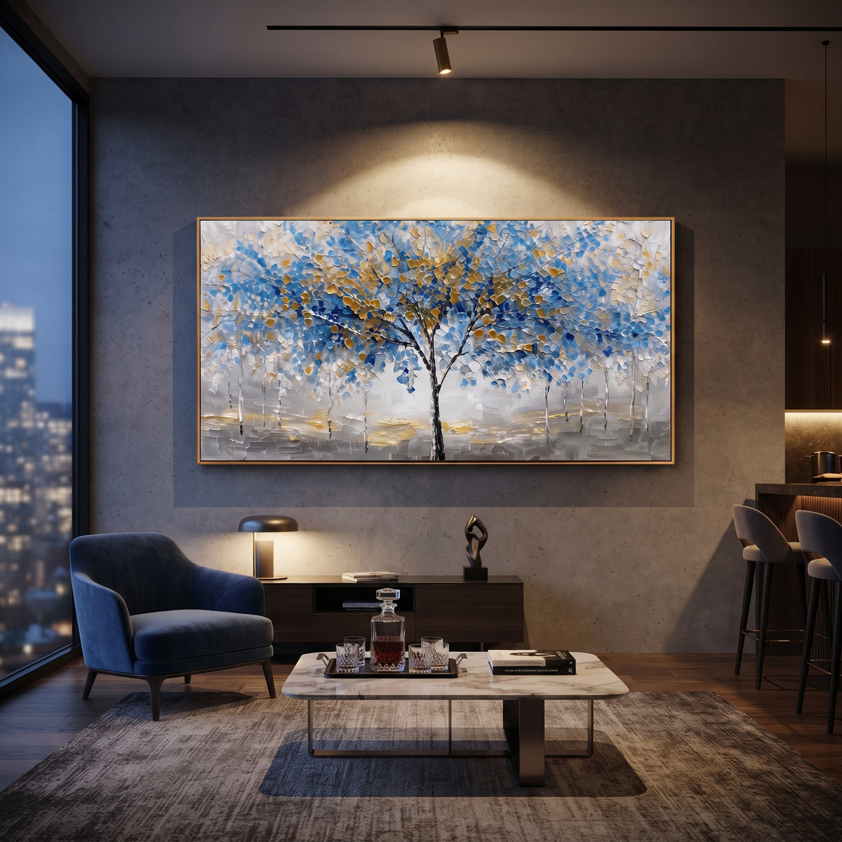 "Blue Gold Tree Painting" focuses on atmosphere, surface movement, and sculptural heavy impasto craftsmanship rather than a fixed literal storyline. The composition uses this hand-painted panoramic canvas presents a central black tree with blue and golden leaves over a grey white textured ground, with slender pale trees in the background as the visual anchor, while layered palette-knife paint, raised plaster-like texture, and softened brush movement create tactile depth across the canvas.