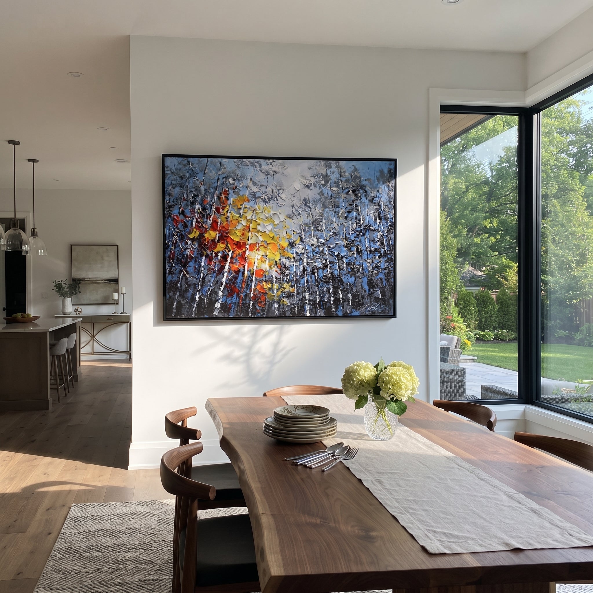 "Blue Birch Autumn Glow Painting" focuses on atmosphere, surface movement, and sculptural heavy impasto craftsmanship rather than a fixed literal storyline. The composition uses this hand-painted horizontal canvas presents blue grey birch woods with white vertical trunks, smoky foliage, and thick red, orange, yellow, and white palette-knife leaves glowing through the center as the visual anchor, while layered palette-knife paint, raised plaster-like texture, and softened brush movement create