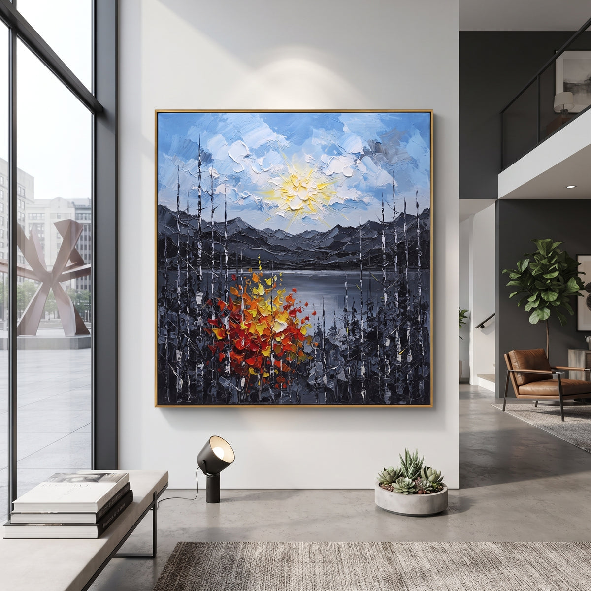 "Autumn Ridge Birch Painting" focuses on atmosphere, surface movement, and sculptural heavy impasto craftsmanship rather than a fixed literal storyline. The composition uses this hand-painted square canvas features a glowing sun above layered grey mountains and a lake, framed by black and white birches with red, orange, and yellow textured autumn leaves as the visual anchor, while layered palette-knife paint, raised plaster-like texture, and softened brush movement create tactile depth across