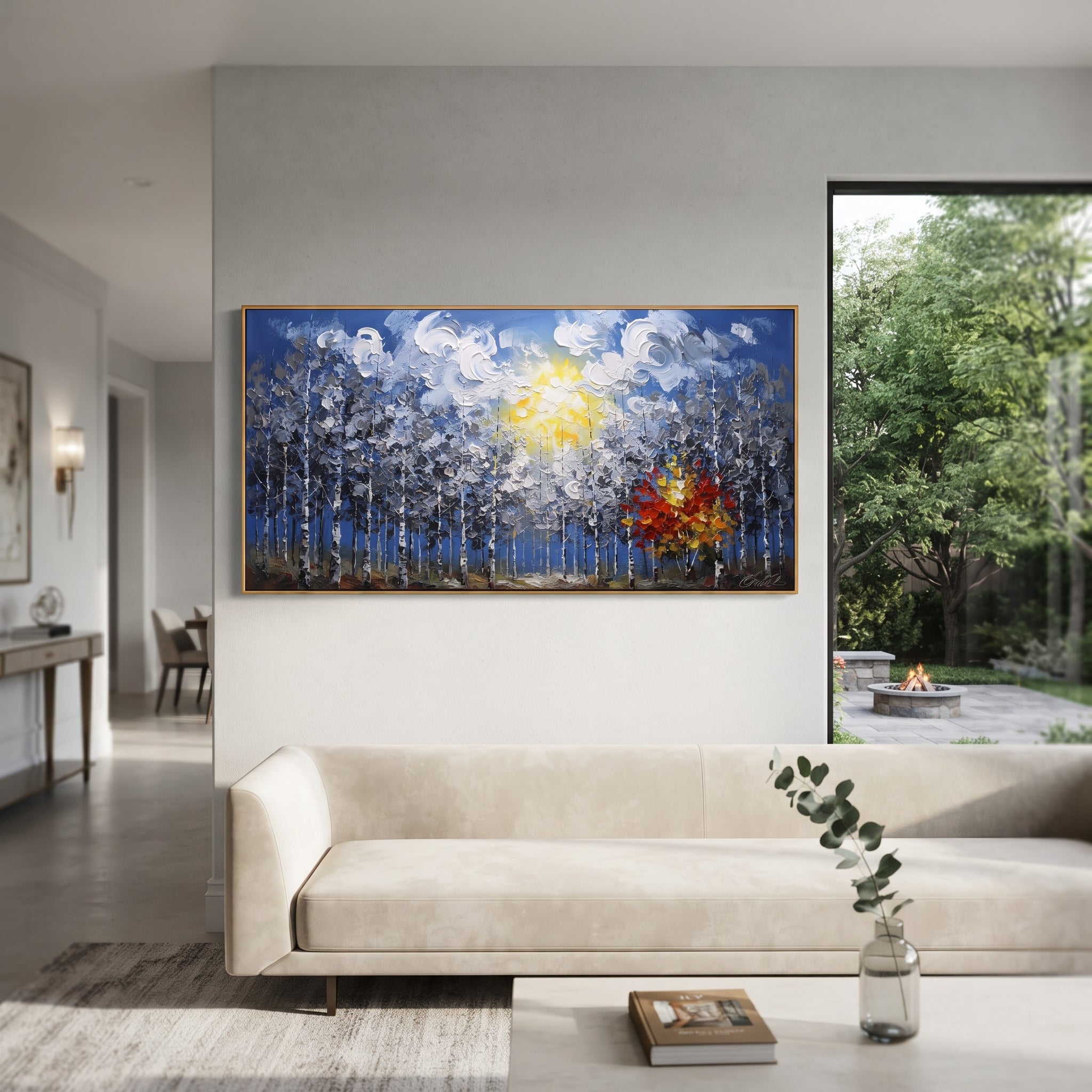"Blue Forest Sunburst Painting" focuses on atmosphere, surface movement, and sculptural heavy impasto craftsmanship rather than a fixed literal storyline. The composition uses this hand-painted panoramic canvas features a blue birch forest under swirling white clouds and a yellow sun, with one red orange autumn tree glowing against cool grey textured woods as the visual anchor, while layered palette-knife paint, raised plaster-like texture, and softened brush movement create tactile depth across