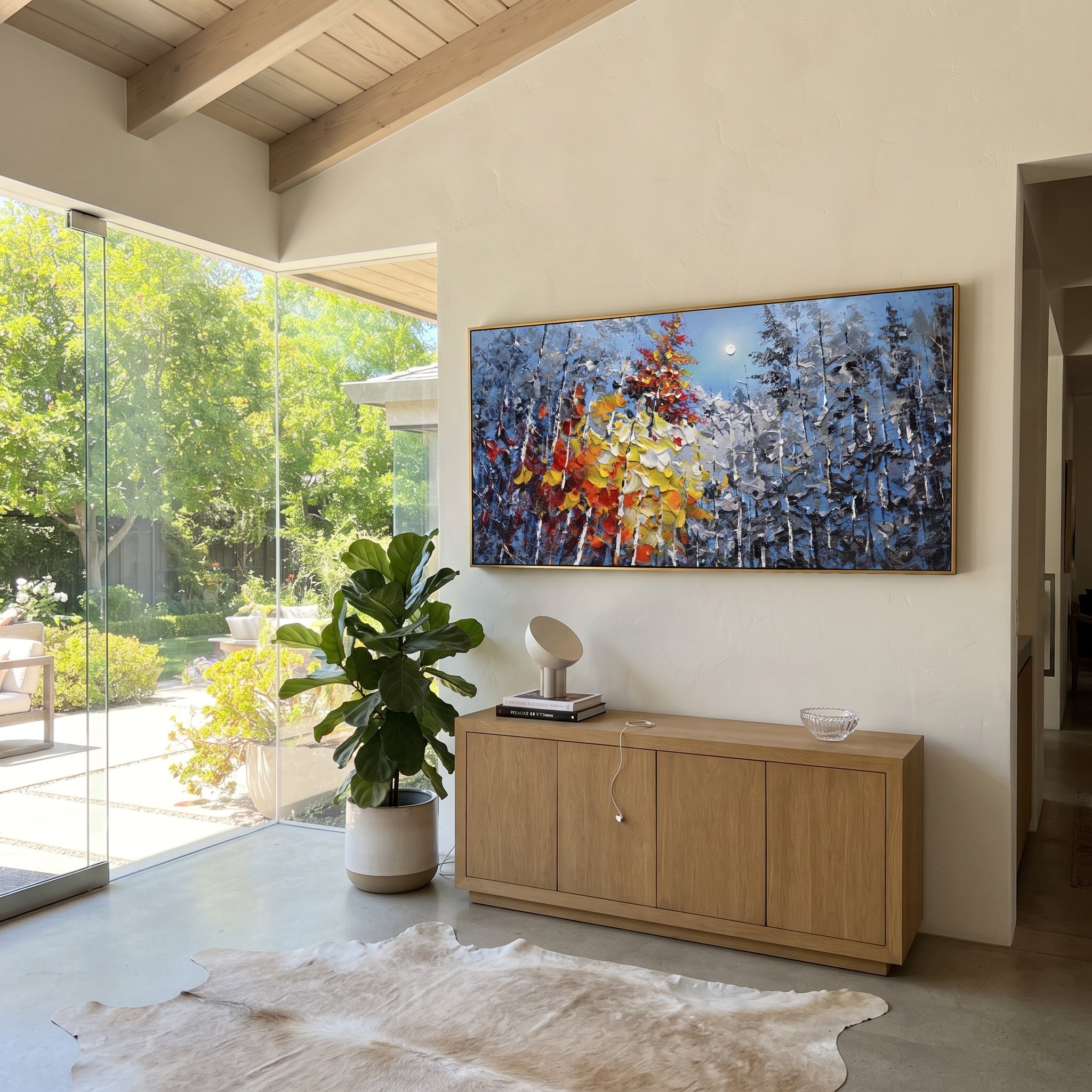 "Blue Silver Autumn Forest Painting" focuses on atmosphere, surface movement, and sculptural heavy impasto craftsmanship rather than a fixed literal storyline. The composition uses this hand-painted panoramic canvas layers blue silver birch woods with black branches and a bold yellow, white, red, and orange leaf mass sweeping through the center as the visual anchor, while layered palette-knife paint, raised plaster-like texture, and softened brush movement create tactile depth across the canvas.
