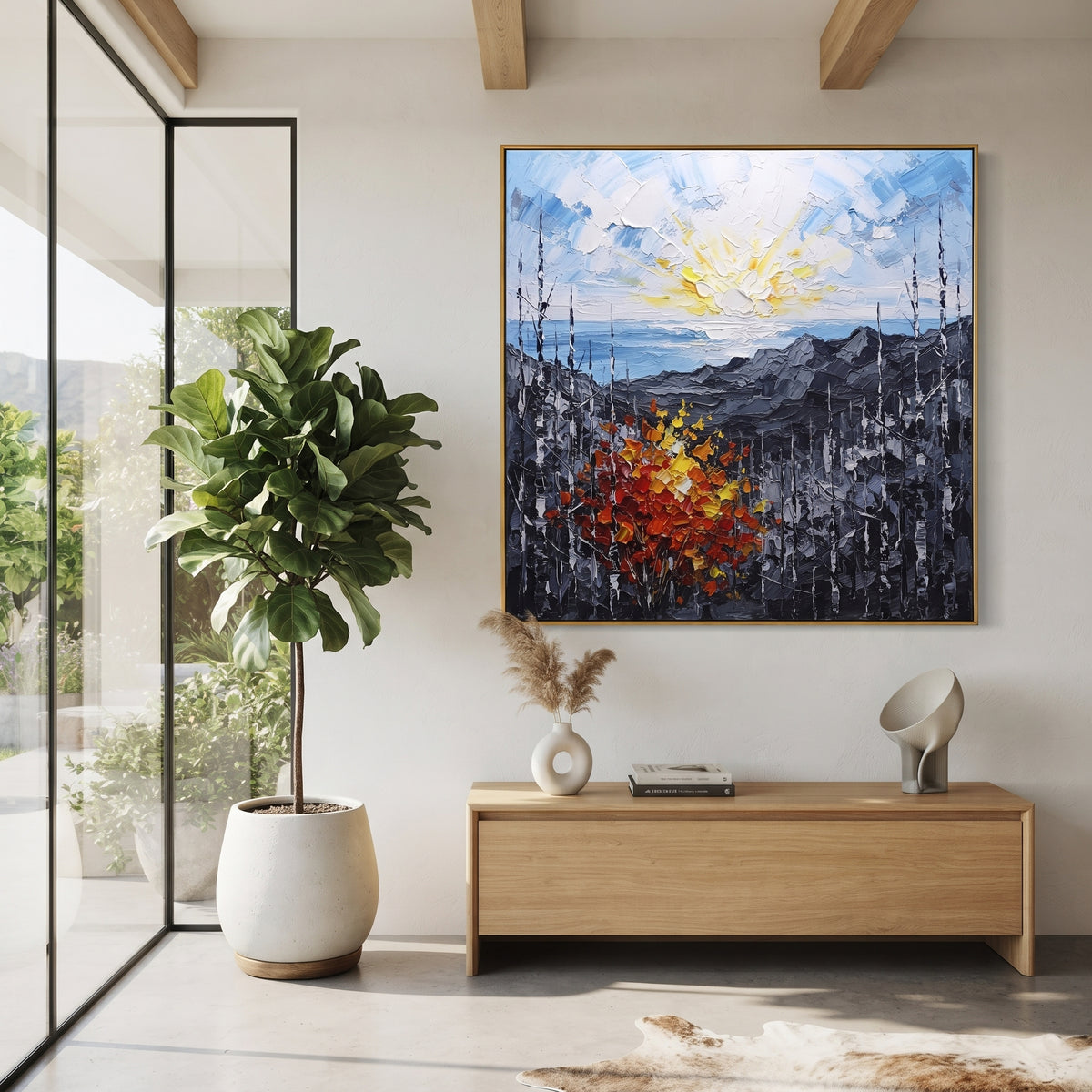 "Sunrise Ridge Birch Painting" focuses on atmosphere, surface movement, and sculptural heavy impasto craftsmanship rather than a fixed literal storyline. The composition uses this hand-painted square canvas presents a glowing sunrise over grey mountain ridges, with black and white birches and a red orange yellow autumn shrub in heavy textured strokes as the visual anchor, while layered palette-knife paint, raised plaster-like texture, and softened brush movement create tactile depth across the