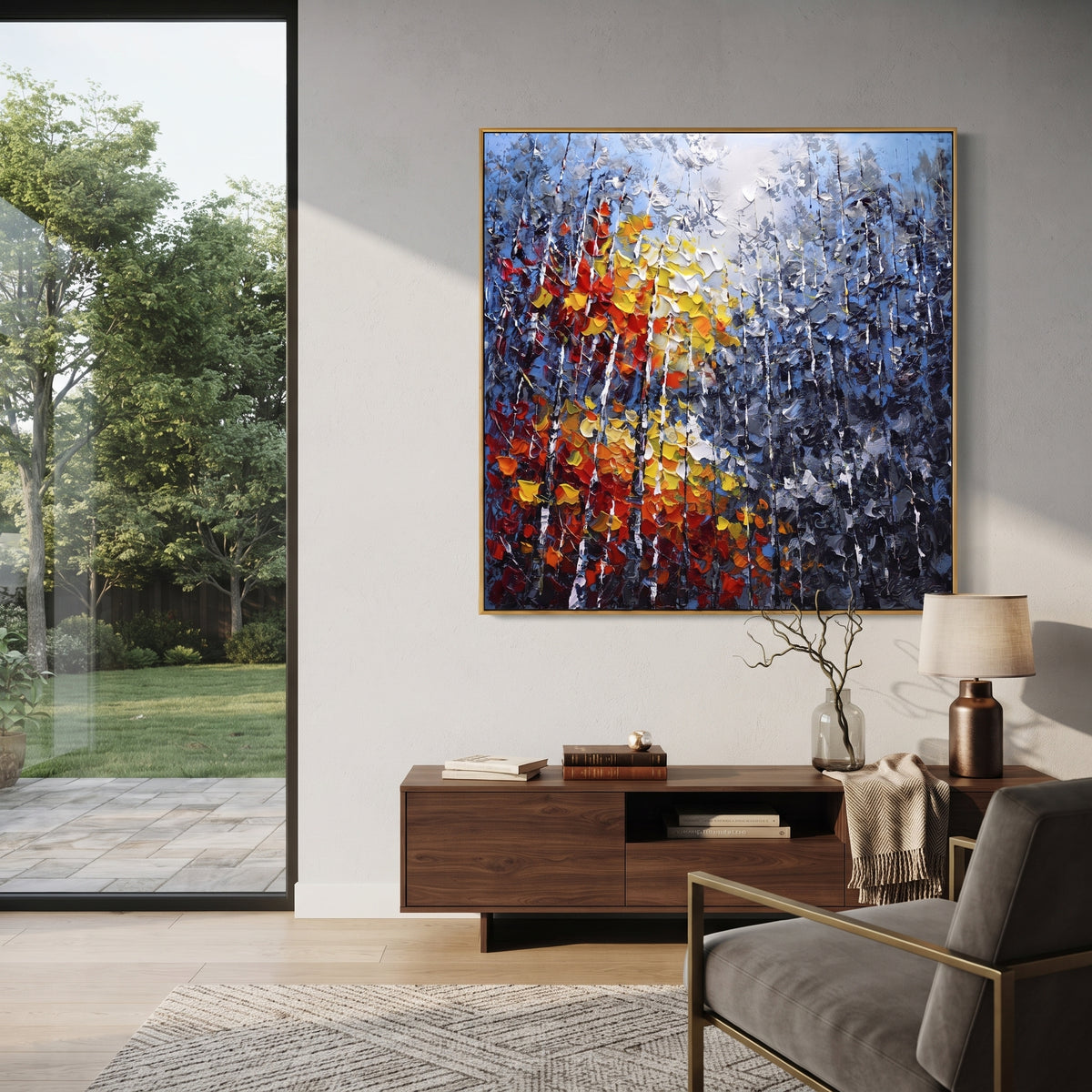 "Blue Grey Autumn Birch Painting" focuses on atmosphere, surface movement, and sculptural heavy impasto craftsmanship rather than a fixed literal storyline. The composition uses this hand-painted square canvas presents layered blue grey woodland, slender white birches, and a close foreground burst of red, orange, yellow, and white leaves in thick impasto texture as the visual anchor, while layered palette-knife paint, raised plaster-like texture, and softened brush movement create tactile depth
