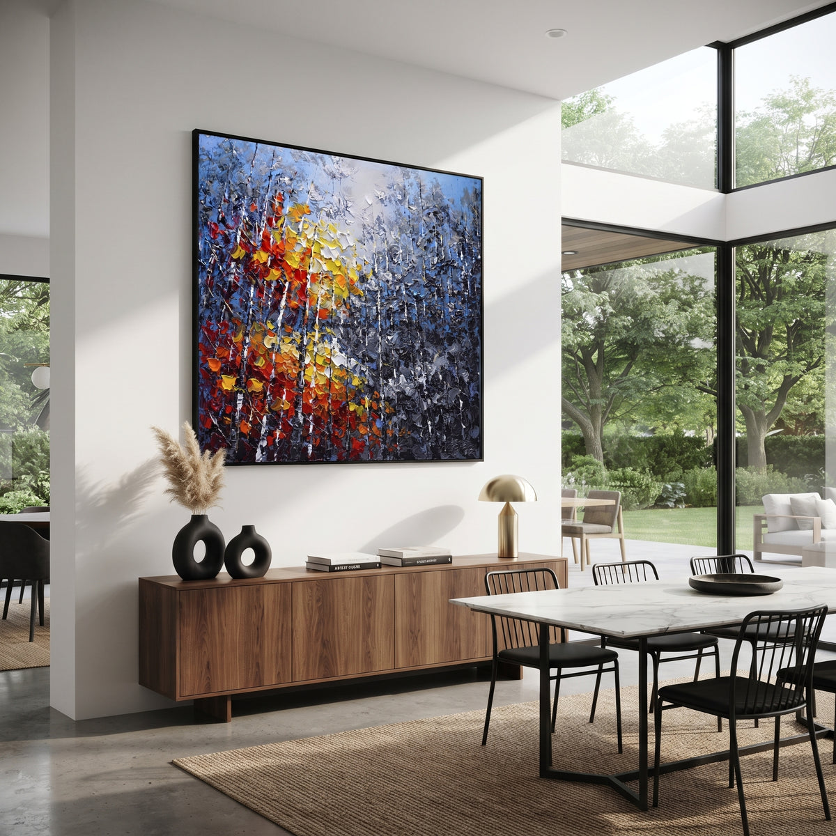 "Blue Grey Autumn Birch Painting" focuses on atmosphere, surface movement, and sculptural heavy impasto craftsmanship rather than a fixed literal storyline. The composition uses this hand-painted square canvas presents layered blue grey woodland, slender white birches, and a close foreground burst of red, orange, yellow, and white leaves in thick impasto texture as the visual anchor, while layered palette-knife paint, raised plaster-like texture, and softened brush movement create tactile depth