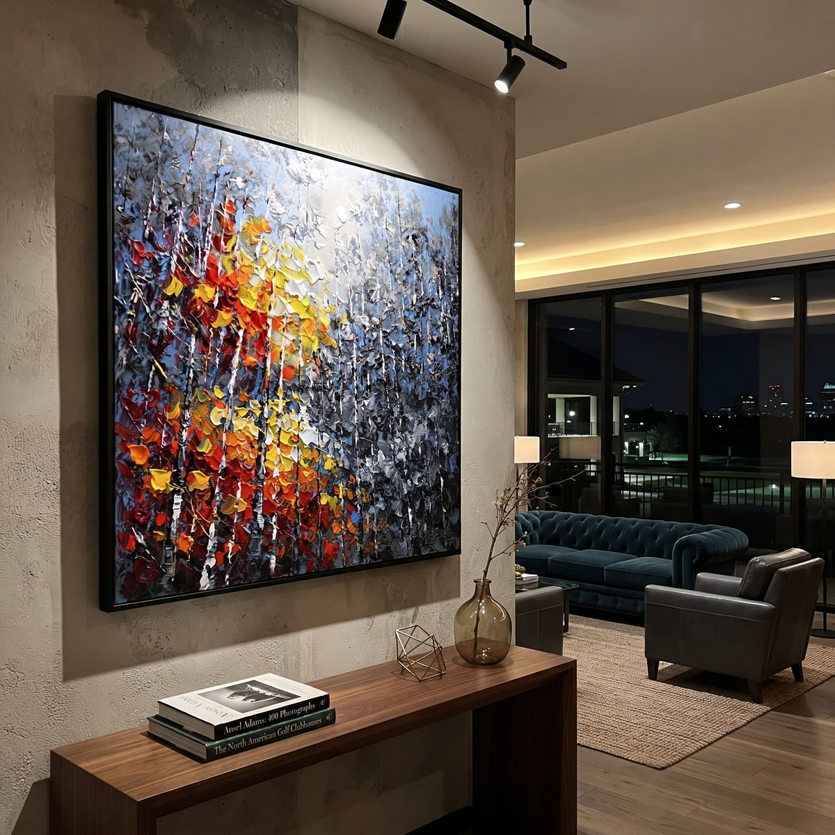 "Blue Grey Autumn Birch Painting" focuses on atmosphere, surface movement, and sculptural heavy impasto craftsmanship rather than a fixed literal storyline. The composition uses this hand-painted square canvas presents layered blue grey woodland, slender white birches, and a close foreground burst of red, orange, yellow, and white leaves in thick impasto texture as the visual anchor, while layered palette-knife paint, raised plaster-like texture, and softened brush movement create tactile depth