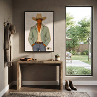 "Front Facing Sage Cowboy Painting" focuses on atmosphere, surface movement, and sculptural heavy impasto craftsmanship rather than a fixed literal storyline. The composition uses this hand-painted vertical canvas presents a front-facing cowboy cropped at the hips, wearing a broad tan hat, pale green jacket, cream shirt, brown belt, and blue grey denim as the visual anchor, while layered palette-knife paint, raised plaster-like texture, and softened brush movement create tactile depth across the