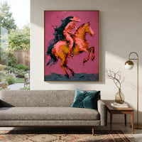 "Rearing Pink Cowboy Horse Painting" focuses on atmosphere, surface movement, and sculptural heavy impasto craftsmanship rather than a fixed literal storyline. The composition uses this hand-painted vertical canvas captures a cowboy riding a rearing horse on a pink textured ground as the visual anchor, while layered palette-knife paint, raised plaster-like texture, and softened brush movement create tactile depth across the canvas. Curated with a balanced pink, brown, orange palette, the artwork