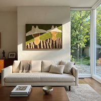 "Two Cowboy Hats Horizontal Painting" focuses on atmosphere, surface movement, and sculptural heavy impasto craftsmanship rather than a fixed literal storyline. The composition uses this hand-painted horizontal canvas shows two cowboy upper bodies under oversized cream hats, set against a muted olive green plaster ground as the visual anchor, while layered palette-knife paint, raised plaster-like texture, and softened brush movement create tactile depth across the canvas. Curated with a balanced