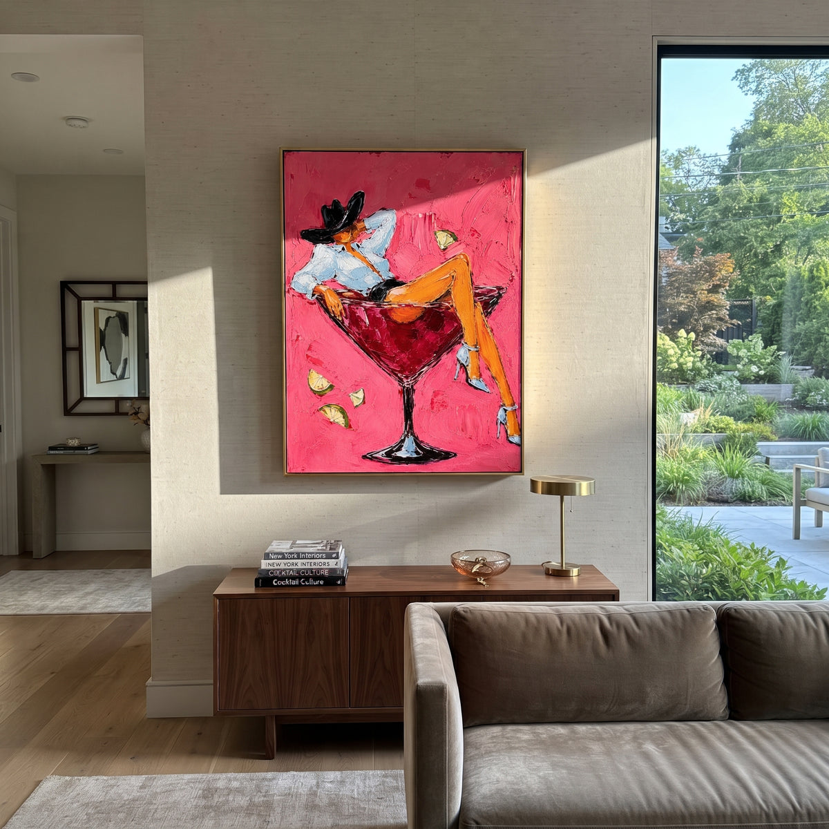 "Reclining Cowgirl Cocktail Painting" focuses on atmosphere, surface movement, and sculptural heavy impasto craftsmanship rather than a fixed literal storyline. The composition uses this hand-painted vertical canvas shows a cowgirl reclining across a red martini glass against a saturated pink plaster background as the visual anchor, while layered palette-knife paint, raised plaster-like texture, and softened brush movement create tactile depth across the canvas. Curated with a balanced pink