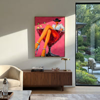 "Rust Face Cowboy Portrait Painting" focuses on atmosphere, surface movement, and sculptural heavy impasto craftsmanship rather than a fixed literal storyline. The composition uses this hand-painted vertical canvas presents a modern faceless cowboy portrait with burnt orange face tones, a sand colored hat, and muted green outerwear on a cream ground as the visual anchor, while layered palette-knife paint, raised plaster-like texture, and softened brush movement create tactile depth across the