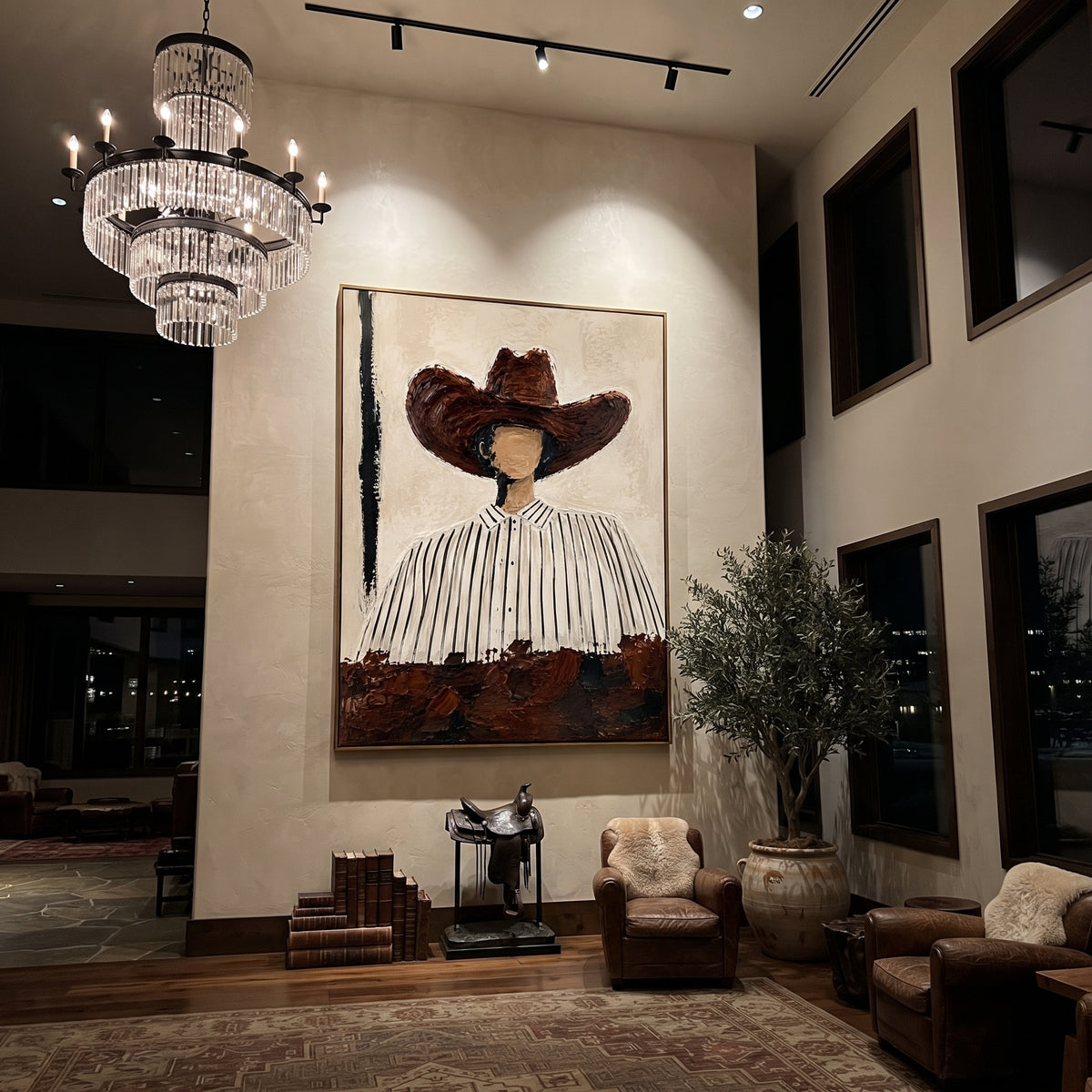 "Round Brown Hat Portrait Painting" focuses on atmosphere, surface movement, and sculptural heavy impasto craftsmanship rather than a fixed literal storyline. The composition uses this hand-painted vertical canvas shows a faceless western figure wearing a large rounded brown hat and a white shirt with narrow black stripes as the visual anchor, while layered palette-knife paint, raised plaster-like texture, and softened brush movement create tactile depth across the canvas. Curated with a