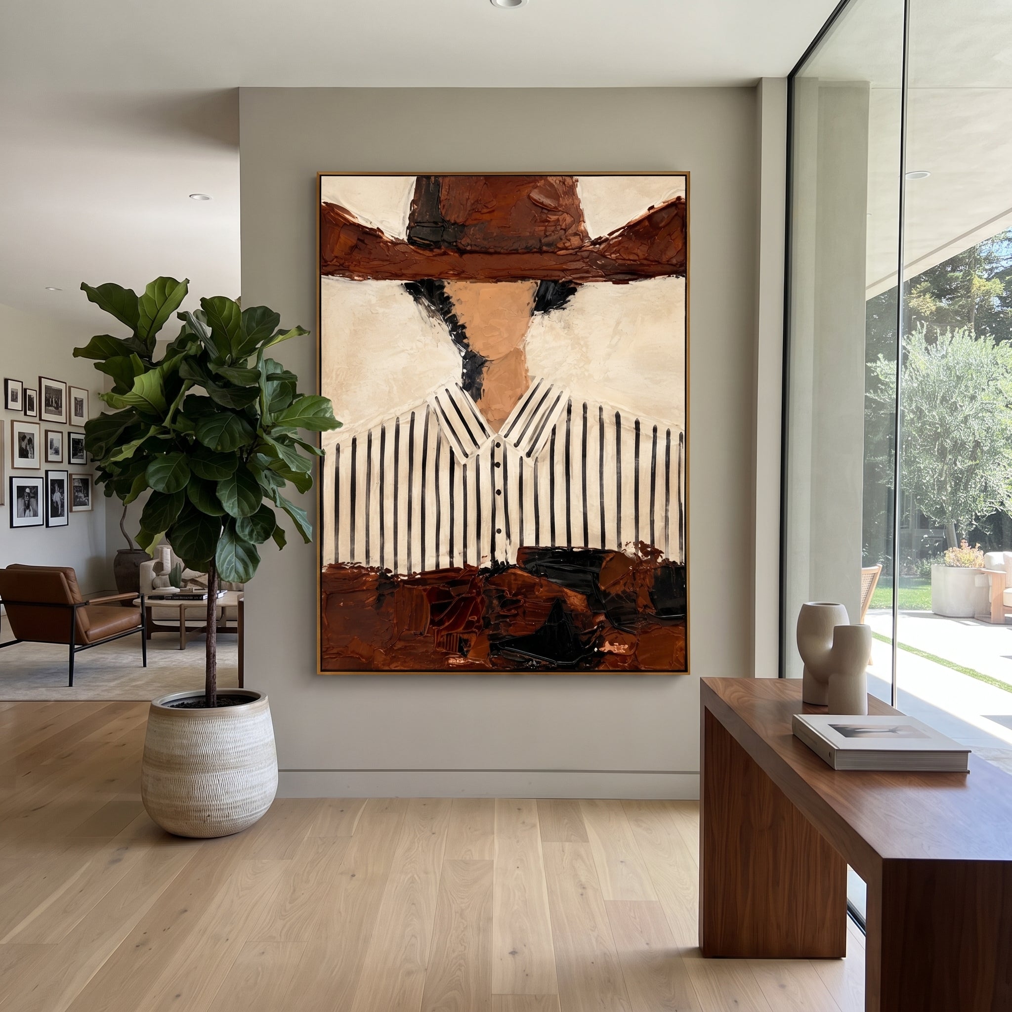 "Cropped Brown Hat Cowboy Painting" focuses on atmosphere, surface movement, and sculptural heavy impasto craftsmanship rather than a fixed literal storyline. The composition uses this hand-painted vertical canvas presents a cropped western portrait with a broad brown hat shadowing a faceless head above a white black-striped shirt as the visual anchor, while layered palette-knife paint, raised plaster-like texture, and softened brush movement create tactile depth across the canvas. Curated with