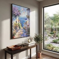 "Cliffside Coastal Vista PT 1567" focuses on atmosphere, surface movement, and sculptural heavy impasto craftsmanship rather than a fixed literal storyline. The composition uses this hand-painted Mediterranean canvas features steep coastal cliffs, hillside village, deep blue water, floral foreground, textured sky, built with raised palette-knife texture, layered brushwork, and luminous coastal color as the visual anchor, while layered palette-knife paint, raised plaster-like texture, and