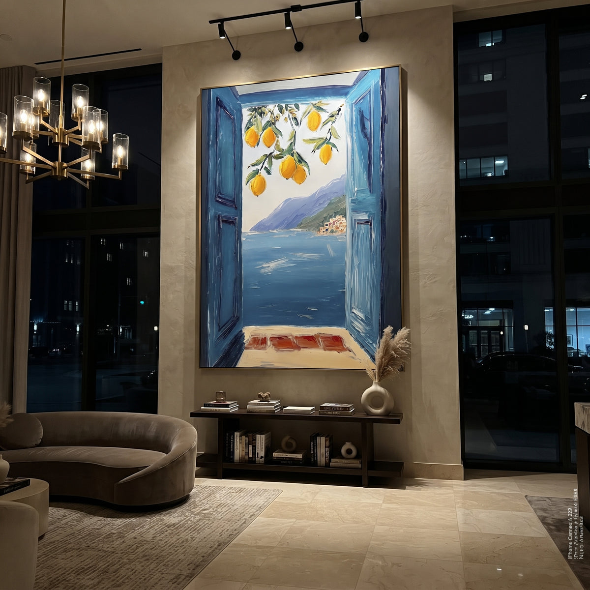 "Lemon Window Seascape PT 1571" focuses on atmosphere, surface movement, and sculptural heavy impasto craftsmanship rather than a fixed literal storyline. The composition uses this hand-painted Mediterranean canvas features open blue shutters, lemon branches, calm sea view, bright white wall and terrace light, built with raised palette-knife texture, layered brushwork, and luminous coastal color as the visual anchor, while layered palette-knife paint, raised plaster-like texture, and softened