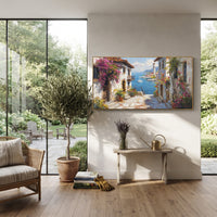 "Harbor Village Reflections PT 1574" focuses on atmosphere, surface movement, and sculptural heavy impasto craftsmanship rather than a fixed literal storyline. The composition uses this hand-painted Mediterranean canvas features colorful waterfront houses, moored boats, shimmering blue harbor reflections, pastel sky, built with raised palette-knife texture, layered brushwork, and luminous coastal color as the visual anchor, while layered palette-knife paint, raised plaster-like texture, and