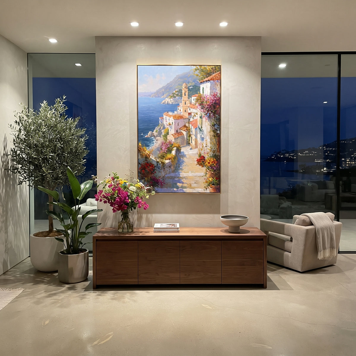 "Blue Bay Rooftops Painting" focuses on atmosphere, surface movement, and sculptural heavy impasto craftsmanship rather than a fixed literal storyline. The composition uses this hand-painted Mediterranean canvas features coastal mountains, small village rooftops, winding shore, blue bay and garden accents, built with raised palette-knife texture, layered brushwork, and luminous coastal color as the visual anchor, while layered palette-knife paint, raised plaster-like texture, and softened brush