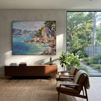 "Amalfi Cliff Coast Study Painting" focuses on atmosphere, surface movement, and sculptural heavy impasto craftsmanship rather than a fixed literal storyline. The composition uses this hand-painted Mediterranean canvas features steep coastal cliffs, hillside village, deep blue water, floral foreground, textured sky, built with raised palette-knife texture, layered brushwork, and luminous coastal color as the visual anchor, while layered palette-knife paint, raised plaster-like texture, and