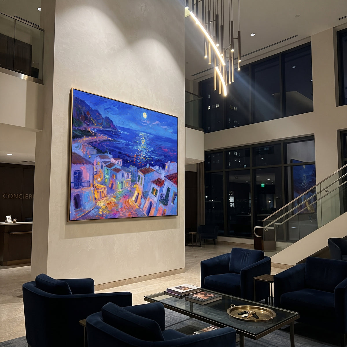 "Moonlit Mediterranean Coast Painting" focuses on atmosphere, surface movement, and sculptural heavy impasto craftsmanship rather than a fixed literal storyline. The composition uses this hand-painted Mediterranean canvas features night blue shoreline, glowing moon on water, quiet village lights and violet shadows, built with raised palette-knife texture, layered brushwork, and luminous coastal color as the visual anchor, while layered palette-knife paint, raised plaster-like texture, and