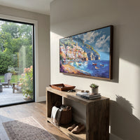 "Harbor Village Reflections Coastal with White Steps Painting" focuses on atmosphere, surface movement, and sculptural heavy impasto craftsmanship rather than a fixed literal storyline. The composition uses this hand-painted Mediterranean canvas features colorful waterfront houses, moored boats, shimmering blue harbor reflections, pastel sky, built with raised palette-knife texture, layered brushwork, and luminous coastal color as the visual anchor, while layered palette-knife paint, raised