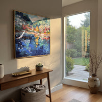 "Harbor Village Reflections Coastal with Lemon Trees Painting" focuses on atmosphere, surface movement, and sculptural heavy impasto craftsmanship rather than a fixed literal storyline. The composition uses this hand-painted Mediterranean canvas features colorful waterfront houses, moored boats, shimmering blue harbor reflections, pastel sky, built with raised palette-knife texture, layered brushwork, and luminous coastal color as the visual anchor, while layered palette-knife paint, raised
