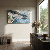 "Painted Village on the Sea Painting" focuses on atmosphere, surface movement, and sculptural heavy impasto craftsmanship rather than a fixed literal storyline. The composition uses this hand-painted Mediterranean canvas features stacked pastel buildings on seaside cliffs, boats below, bright impasto coastal color, built with raised palette-knife texture, layered brushwork, and luminous coastal color as the visual anchor, while layered palette-knife paint, raised plaster-like texture, and