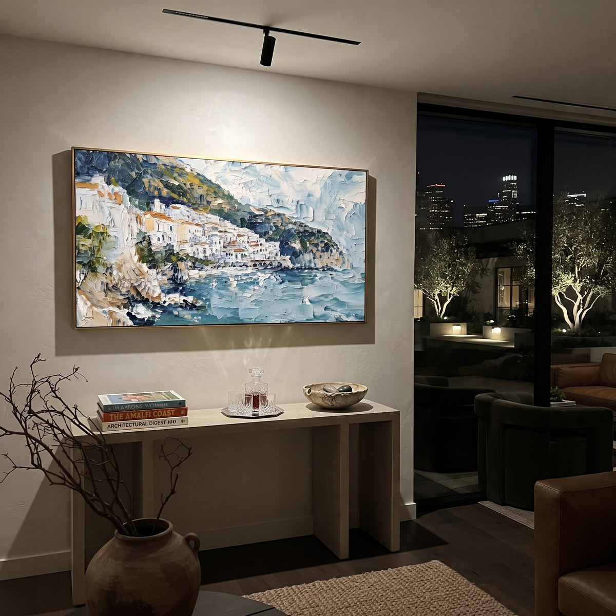 "Painted Village on the Sea Painting" focuses on atmosphere, surface movement, and sculptural heavy impasto craftsmanship rather than a fixed literal storyline. The composition uses this hand-painted Mediterranean canvas features stacked pastel buildings on seaside cliffs, boats below, bright impasto coastal color, built with raised palette-knife texture, layered brushwork, and luminous coastal color as the visual anchor, while layered palette-knife paint, raised plaster-like texture, and