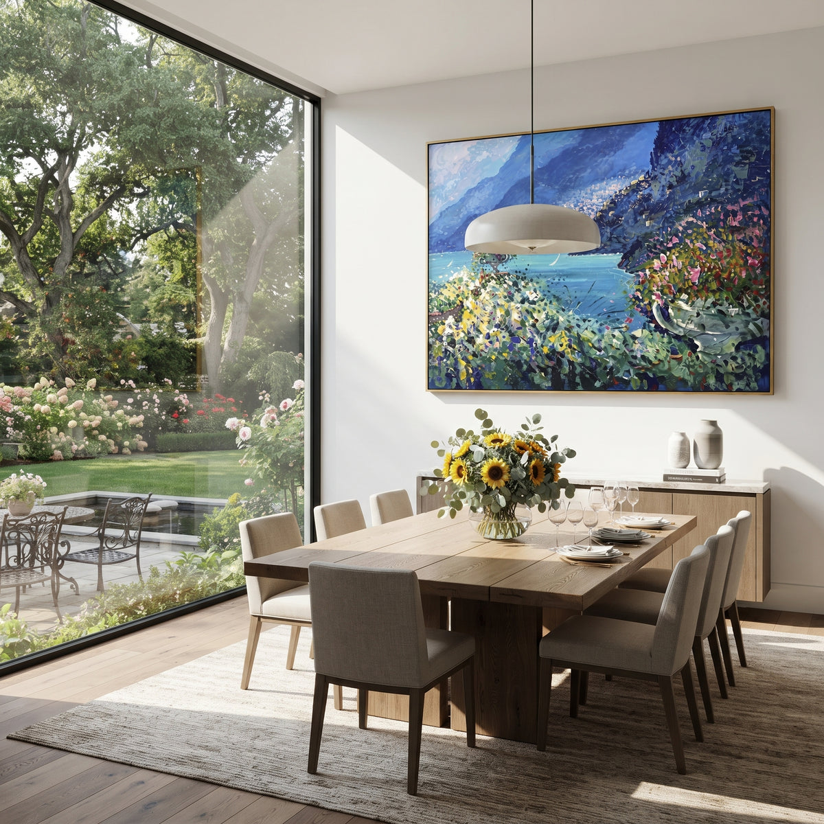 "Sailing Coast Garden Coastal with Cliff Flowers Painting" focuses on atmosphere, surface movement, and sculptural heavy impasto craftsmanship rather than a fixed literal storyline. The composition uses this hand-painted Mediterranean canvas features sailboats on a blue bay, flowering terrace, coastal town and luminous summer sky, built with raised palette-knife texture, layered brushwork, and luminous coastal color as the visual anchor, while layered palette-knife paint, raised plaster-like
