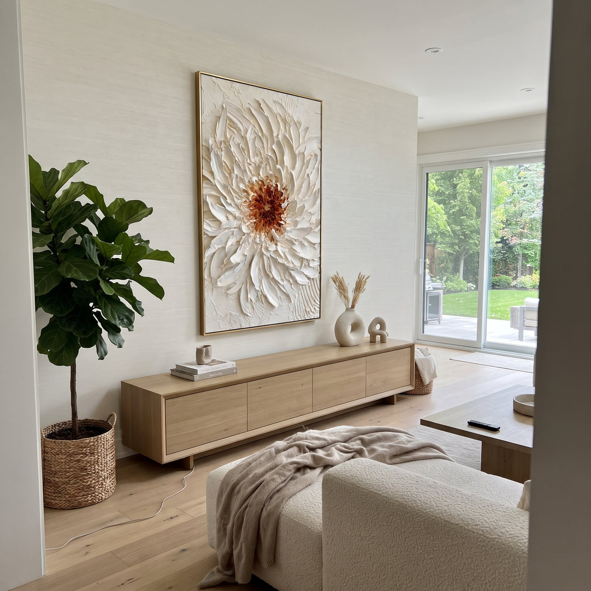 This white chrysanthemum relief painting centers on a sculptural blossom made from thick ivory palette-knife petals and a warm amber brown core. The raised floral texture gives the artwork real handmade depth while the soft neutral palette keeps it refined for contemporary rooms.
