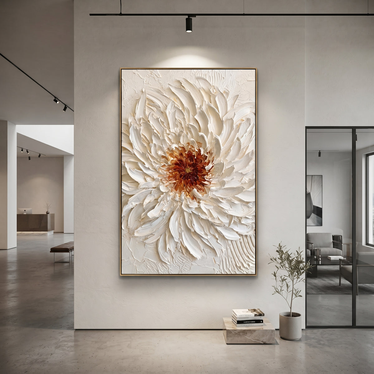 This white chrysanthemum relief painting centers on a sculptural blossom made from thick ivory palette-knife petals and a warm amber brown core. The raised floral texture gives the artwork real handmade depth while the soft neutral palette keeps it refined for contemporary rooms.