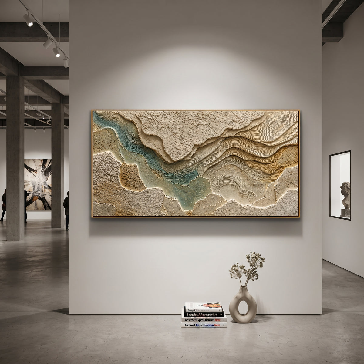This topographic plaster relief painting uses raised earth-toned plates, carved contour lines, and muted teal passages to suggest a terrain map or river valley. Its panoramic format gives the sculptural abstract surface a wide architectural presence.