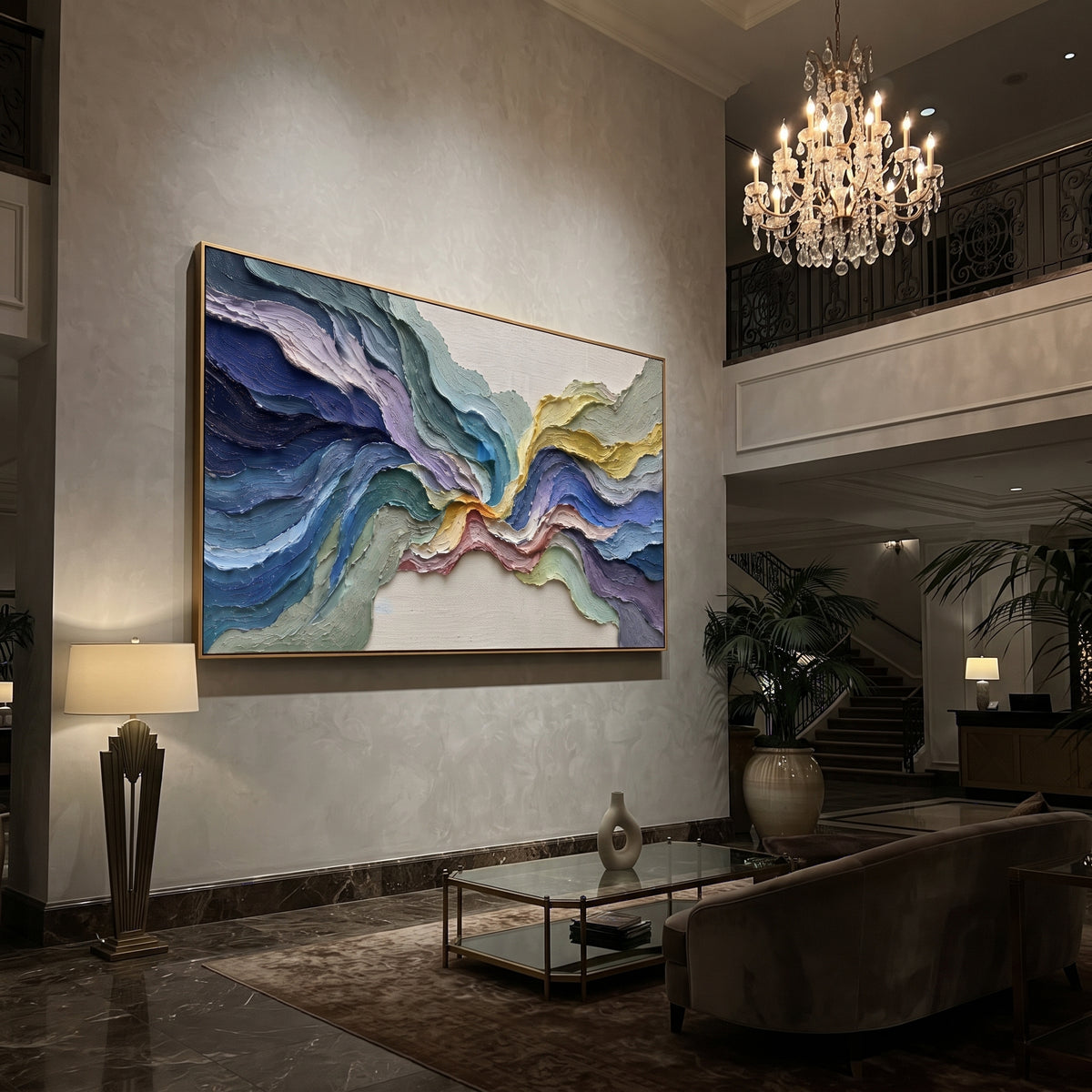 This colorful flowing terrain relief painting is built from thick curving bands of blue, teal, lavender, sage, and golden yellow. The panoramic composition feels like abstract topography, giving the wall layered motion and bright handmade texture.