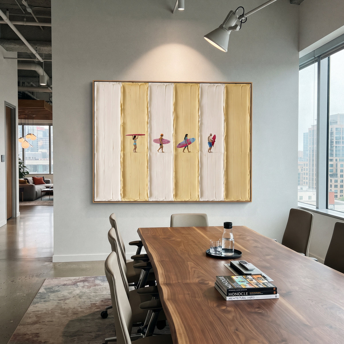 This striped surfer beach relief painting pairs raised ivory and yellow plaster bands with a row of tiny beach figures carrying colorful surfboards. The wide format brings a playful coastal rhythm while preserving a handmade textured surface.