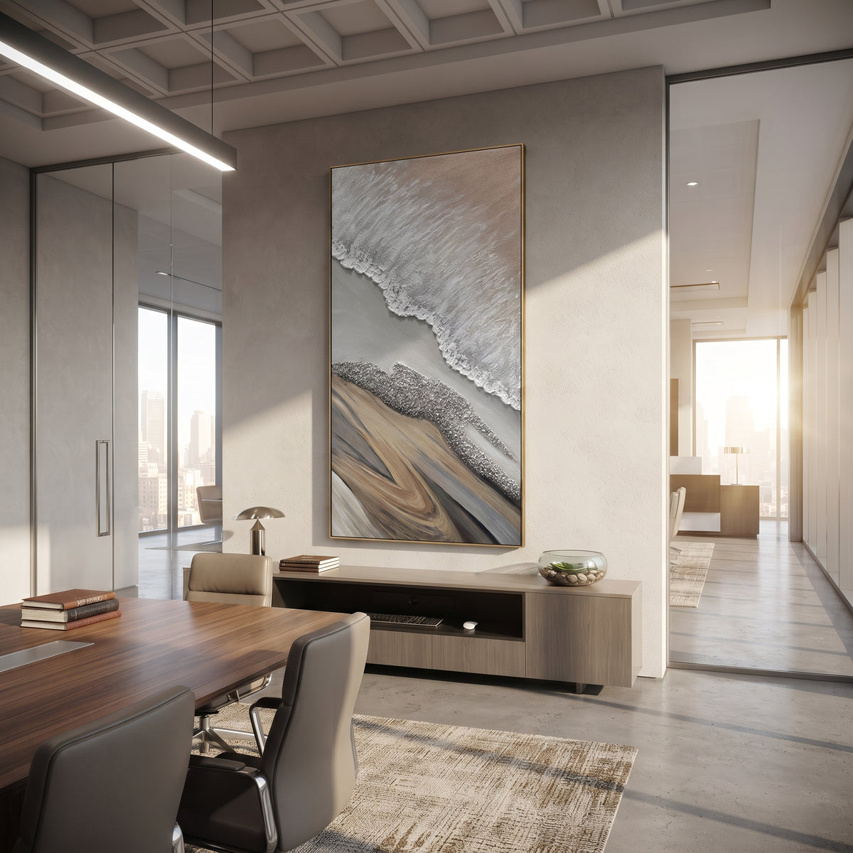 This abstract shoreline relief painting uses white raised ridges, grey passages, and sandy beige forms to suggest a quiet coast from above. The vertical format and tactile plaster surface make the piece calm, natural, and architectural.