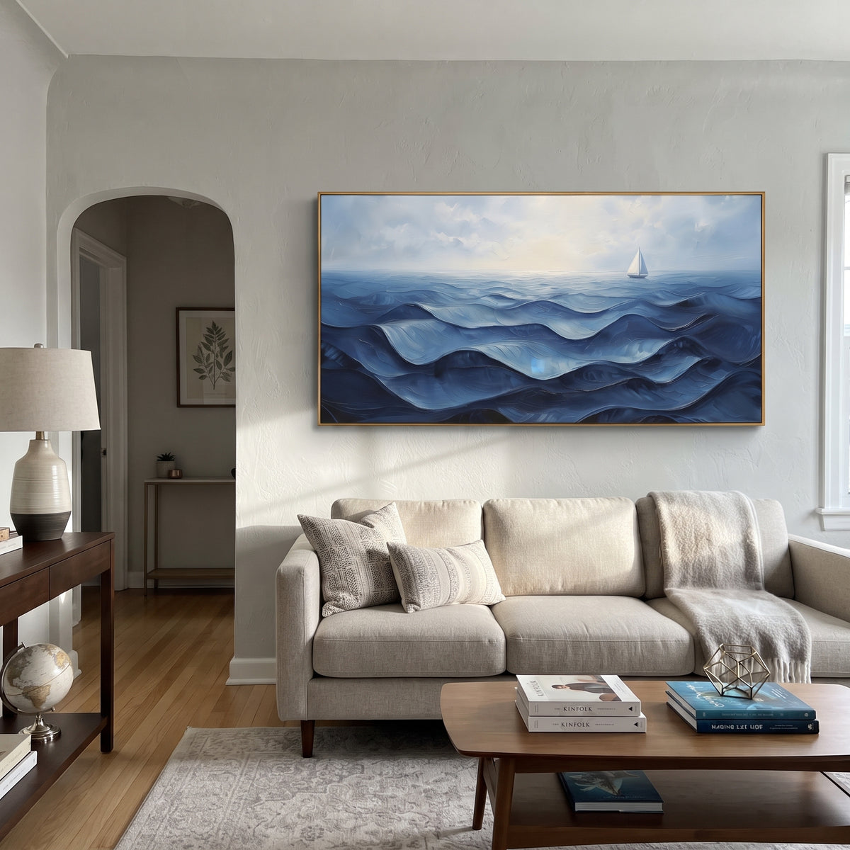Blue Sailboat Ocean Relief focuses on this hand-painted panoramic textured canvas presents layered blue ocean waves under a pale sky, with a small white sailboat near the horizon and softly raised impasto water movement. The composition is described from the actual main image, so the visible subject, color balance, spacing, and surface movement stay specific to this product instead of reading like a batch title. Raised palette-knife layers, sculpted impasto ridges, softened brush transitions