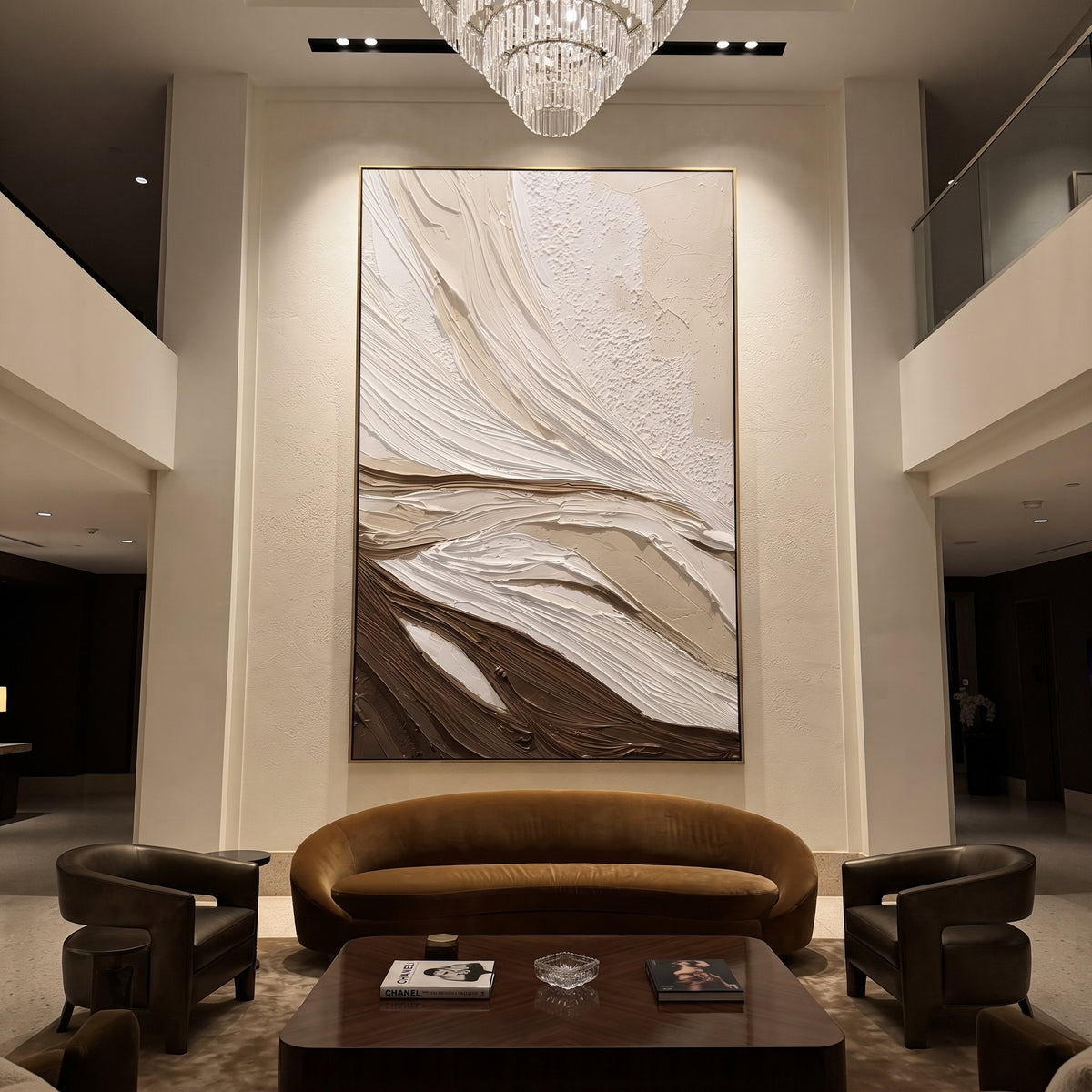 Brown White Flow Relief focuses on this hand-painted vertical textured canvas features sweeping white and warm brown carved plaster ridges, layered beige ground, and a dune-like abstract topographic flow. The composition is described from the actual main image, so the visible subject, color balance, spacing, and surface movement stay specific to this product instead of reading like a batch title. Raised palette-knife layers, sculpted impasto ridges, softened brush transitions, and tactile
