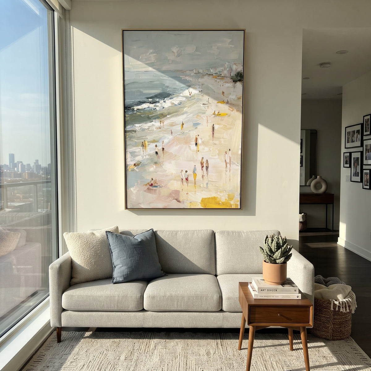 Soft City Beach Promenade focuses on this hand-painted textured canvas features a pale coastal promenade with distant city buildings, soft blue water, walking figures, yellow accents, and raised palette-knife beach texture. The composition is described from the actual main image, so the visible subject, color balance, spacing, and surface movement stay specific to this product instead of reading like a batch title. Raised palette-knife layers, sculpted impasto ridges, softened brush transitions