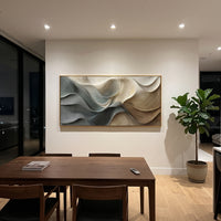 Neutral Ribbon Wave Relief focuses on this hand-painted textured canvas features flowing ribbon-like waves, fine carved contour lines, warm beige and grey shadows, and layered sculptural abstract relief. The composition is described from the actual main image, so the visible subject, color balance, spacing, and surface movement stay specific to this product instead of reading like a batch title. Raised palette-knife layers, sculpted impasto ridges, softened brush transitions, and tactile