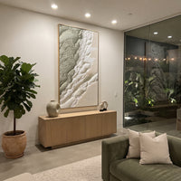 Sage White Topographic Relief focuses on this hand-painted textured canvas features organic topographic plaster ridges, sage green textured fields, raised white flowing forms, and quiet beige mineral surface detail. The composition is described from the actual main image, so the visible subject, color balance, spacing, and surface movement stay specific to this product instead of reading like a batch title. Raised palette-knife layers, sculpted impasto ridges, softened brush transitions, and