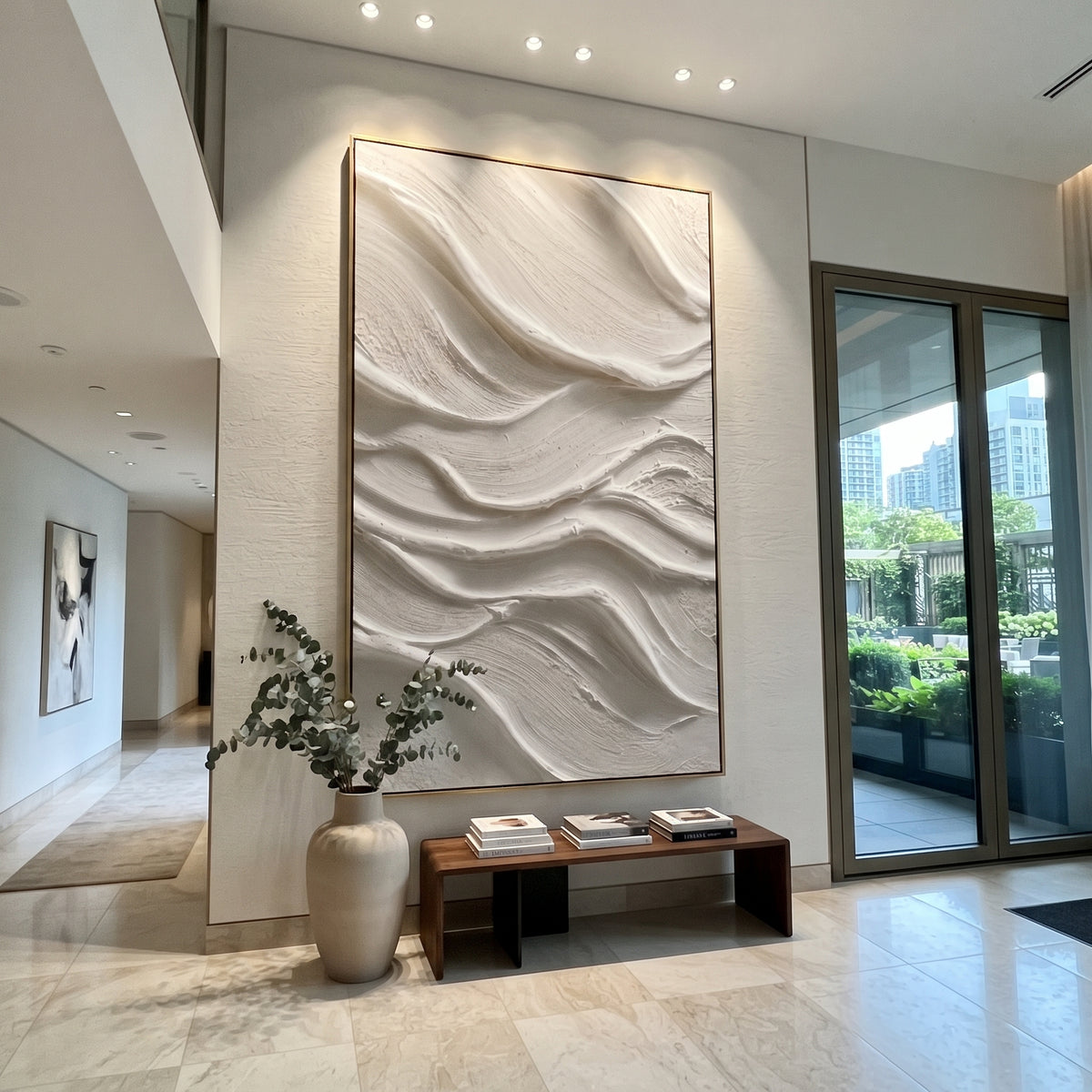White Flowing Ridge Relief focuses on this hand-painted textured canvas features soft white raised ridges, flowing sculptural bands, fine combed texture, and serene monochrome plaster movement. The composition is described from the actual main image, so the visible subject, color balance, spacing, and surface movement stay specific to this product instead of reading like a batch title. Raised palette-knife layers, sculpted impasto ridges, softened brush transitions, and tactile handmade texture