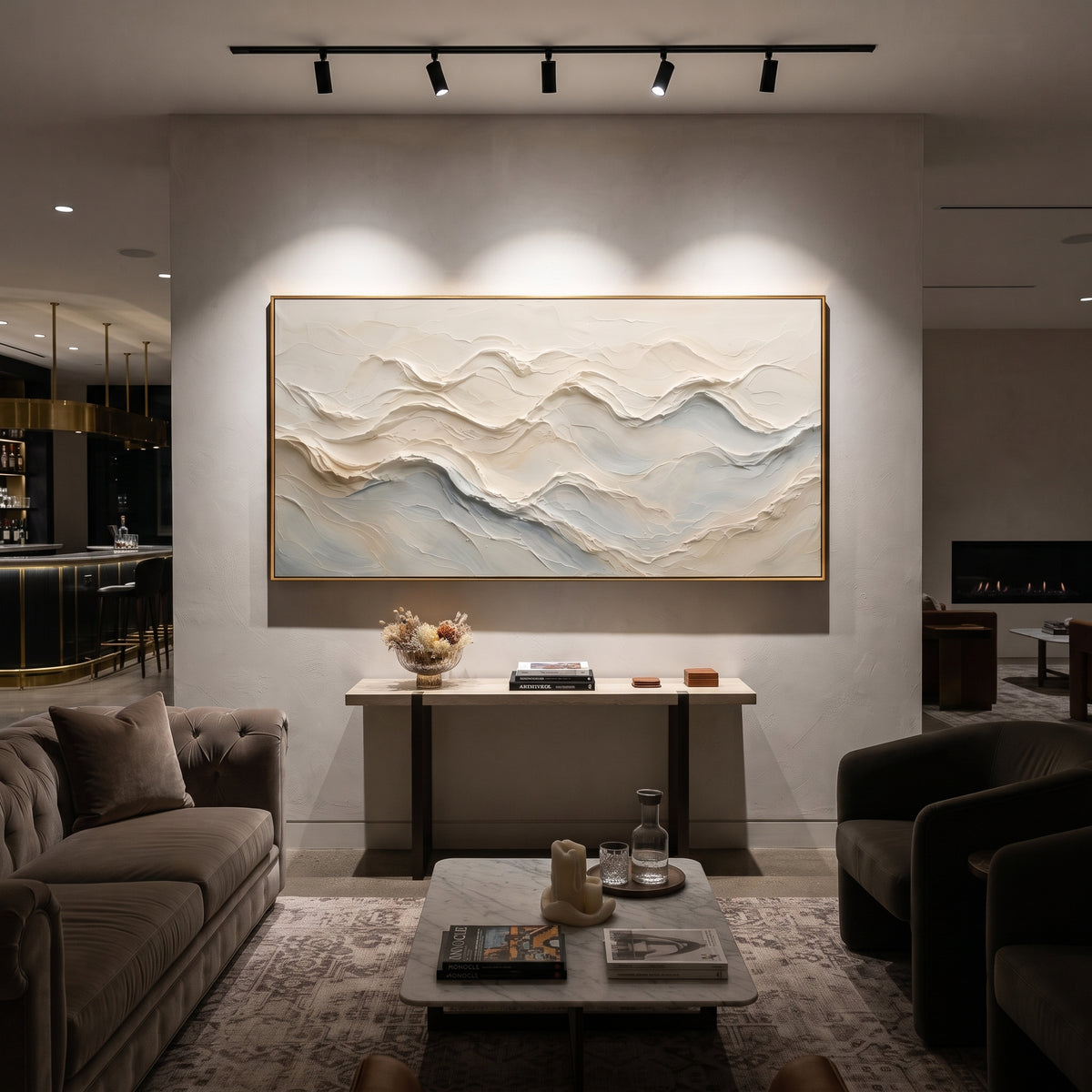 Soft White Mountain Ridge focuses on this hand-painted textured canvas features soft layered white and grey ridges resembling distant mountains, built from smooth raised plaster bands. The composition is described from the actual main image, so the visible subject, color balance, spacing, and surface movement stay specific to this product instead of reading like a batch title. Raised palette-knife layers, sculpted impasto ridges, softened brush transitions, and tactile handmade texture give the