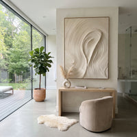 Cream Oval Flow Relief focuses on this hand-painted textured canvas features smooth cream plaster arcs forming an oval flow with fine combed lines and sculptural raised movement. The composition is described from the actual main image, so the visible subject, color balance, spacing, and surface movement stay specific to this product instead of reading like a batch title. Raised palette-knife layers, sculpted impasto ridges, softened brush transitions, and tactile handmade texture give the canvas