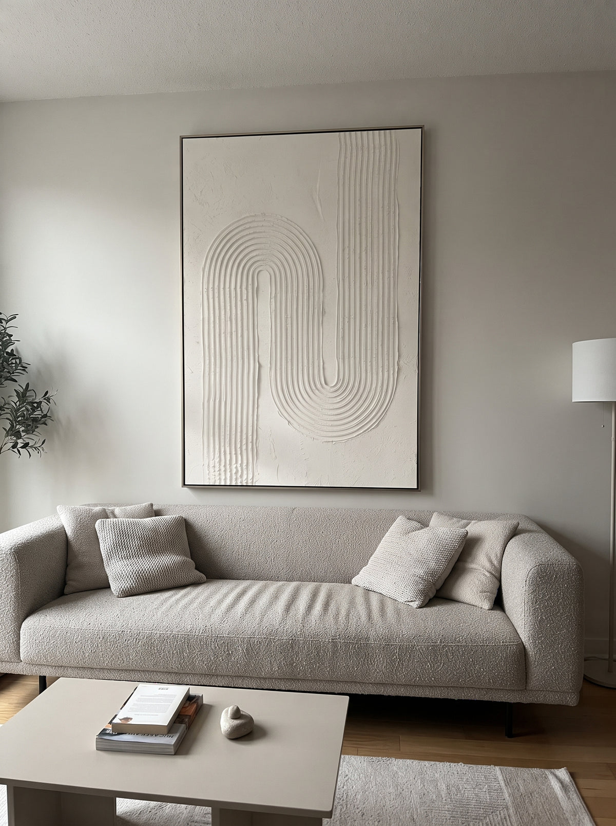 White Loop Line Relief focuses on this hand-painted textured canvas features abstract plaster relief, carved organic movement, layered neutral surfaces, and sculptural handmade texture, built with raised palette-knife texture, layered brushwork, and sculptural plaster-like depth. The composition is described from the actual main image, so the visible subject, color balance, spacing, and surface movement stay specific to this product instead of reading like a batch title. Raised palette-knife