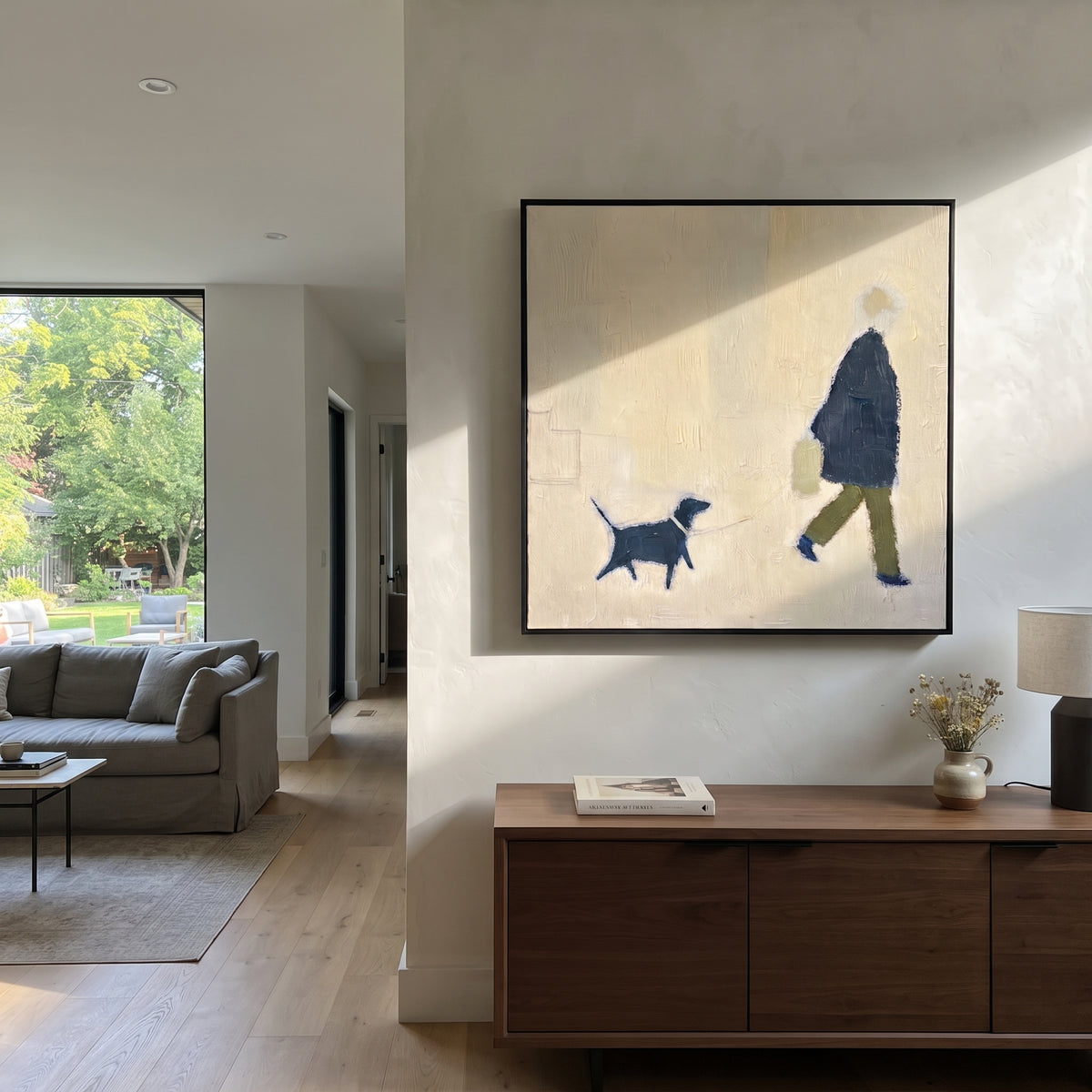 Blue Dog Walker Minimal focuses on this hand-painted textured canvas features soft minimal figure walking a small blue dog across a cream textured square canvas. The composition is described from the actual main image, so the visible subject, color balance, spacing, and surface movement stay specific to this product instead of reading like a batch title. Raised palette-knife layers, sculpted impasto ridges, softened brush transitions, and tactile handmade texture give the canvas dimensional