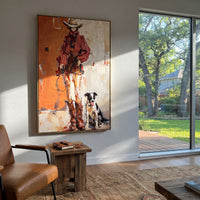 Cowboy With Border Collie focuses on this hand-painted textured canvas features western cowboy in red beside boots and a black white dog on a warm orange wall. The composition is described from the actual main image, so the visible subject, color balance, spacing, and surface movement stay specific to this product instead of reading like a batch title. Raised palette-knife layers, sculpted impasto ridges, softened brush transitions, and tactile handmade texture give the canvas dimensional depth