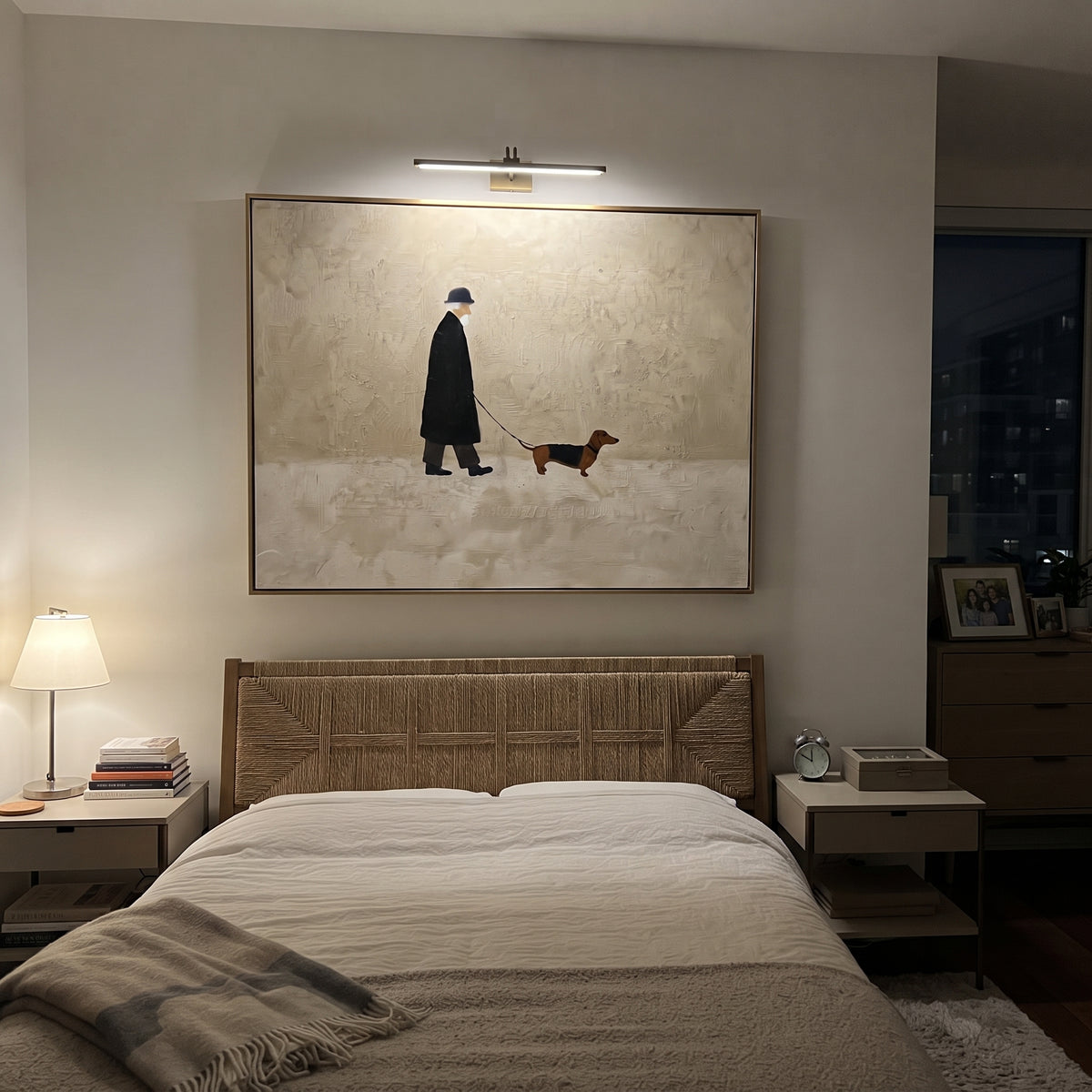 Black Coat Walker With Dachshund focuses on this hand-painted textured canvas features black coated figure walking a brown dachshund across a clean cream horizontal ground. The composition is described from the actual main image, so the visible subject, color balance, spacing, and surface movement stay specific to this product instead of reading like a batch title. Raised palette-knife layers, sculpted impasto ridges, softened brush transitions, and tactile handmade texture give the canvas