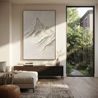 White Mountain Peak Relief focuses on this hand-painted textured canvas features single White Mountain Peak Relief with carved snow ridges and minimal plaster ground. The composition is described from the actual main image, so the visible subject, color balance, spacing, and surface movement stay specific to this product instead of reading like a batch title. Raised palette-knife layers, sculpted impasto ridges, softened brush transitions, and tactile handmade texture give the canvas dimensional
