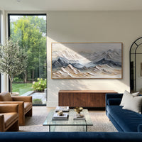 Grey Snow Mountain Range focuses on this hand-painted textured canvas features grey snow mountain range with sharp ridges, white peaks, and cool shadowed slopes. The composition is described from the actual main image, so the visible subject, color balance, spacing, and surface movement stay specific to this product instead of reading like a batch title. Raised palette-knife layers, sculpted impasto ridges, softened brush transitions, and tactile handmade texture give the canvas dimensional