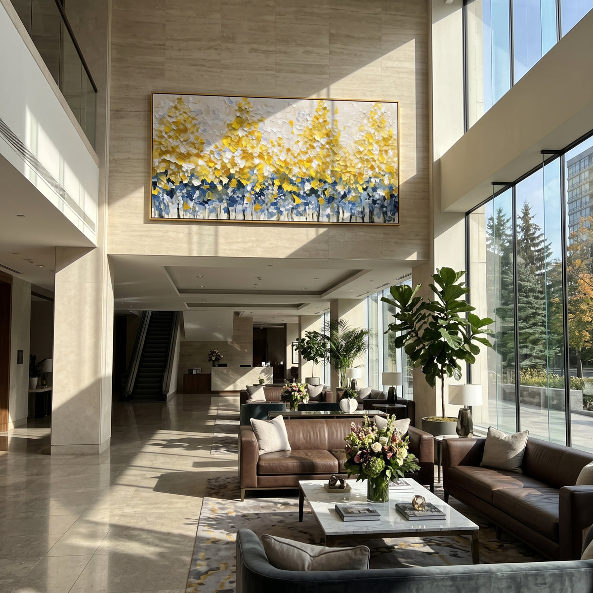 ARTWORK DETAILS Raised Gold Hedge Painting is built from the actual artwork image: low band of thick yellow leaves above blue shadow marks. The composition uses raised texture to separate tree trunks, leaf masses, ground movement, and soft background atmosphere, so the surface reads with real hand-painted depth from different viewing angles. The color direction is yellow, blue, white, chosen to keep the autumn mood warm while still leaving enough pale air and cool contrast for modern interiors.