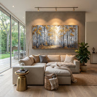 ARTWORK DETAILS Silver Woodland Road Painting is built from the actual artwork image: silver gray woodland road touched by scattered gold leaves. The composition uses raised texture to separate tree trunks, leaf masses, ground movement, and soft background atmosphere, so the surface reads with real hand-painted depth from different viewing angles. The color direction is gray, yellow, white, chosen to keep the autumn mood warm while still leaving enough pale air and cool contrast for modern